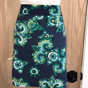 Navy skirt green, yellow, blue and white design